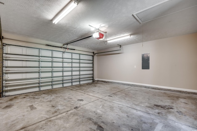 garage with electric panel and a garage door opener