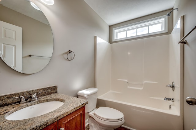 full bathroom with vanity, toilet, shower / bath combination, and a textured ceiling