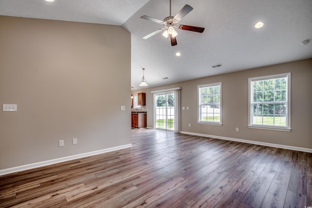 unfurnished living room with ceiling fan, light hardwood / wood-style flooring, and lofted ceiling