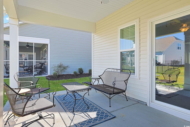 view of patio with ceiling fan