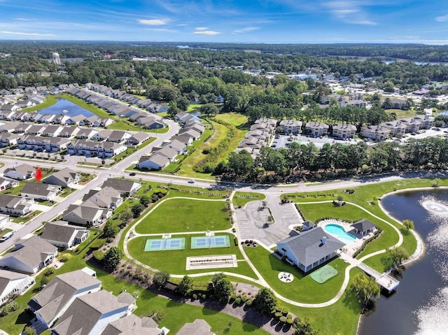 bird's eye view with a water view