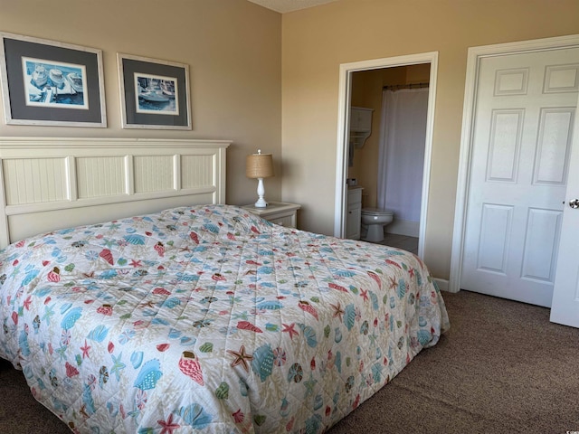 bedroom featuring carpet and ensuite bathroom