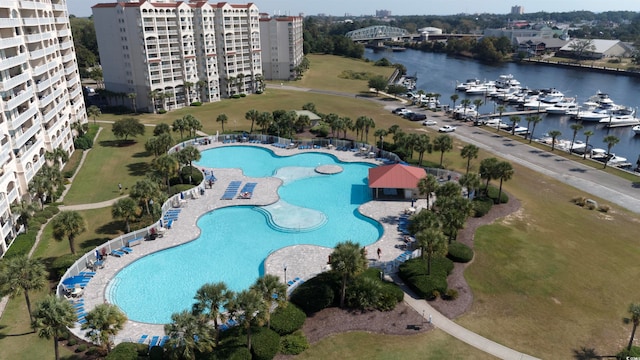 birds eye view of property featuring a water view