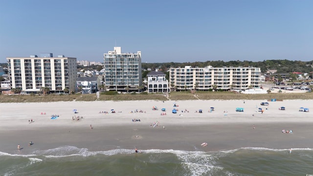 bird's eye view with a view of the beach and a water view