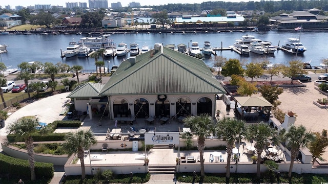 birds eye view of property featuring a water view