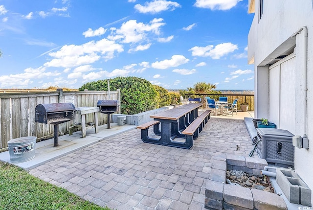 view of patio featuring a grill