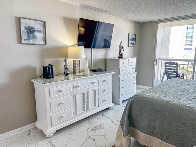 bedroom featuring a textured ceiling