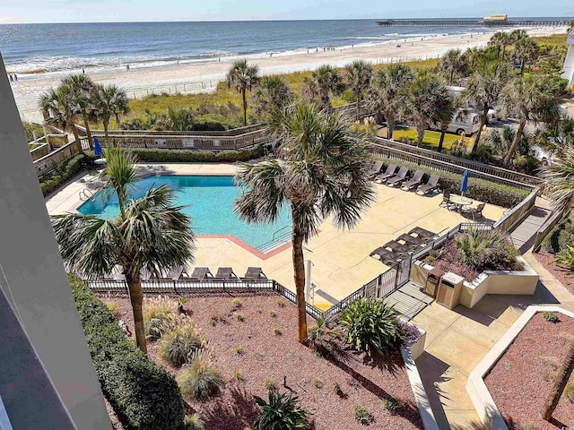 aerial view featuring a water view and a view of the beach