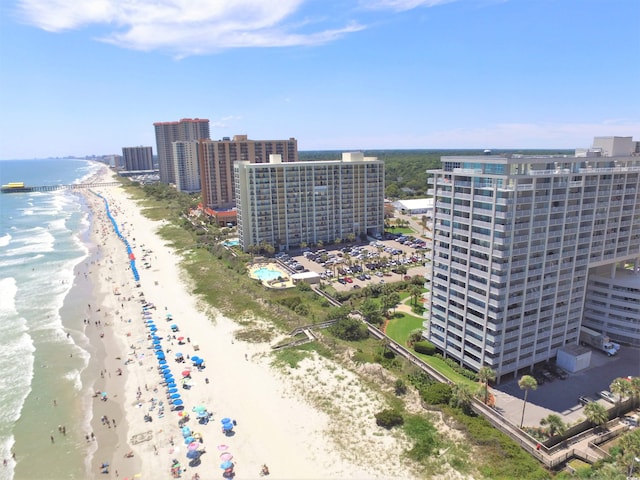 aerial view featuring a water view and a beach view