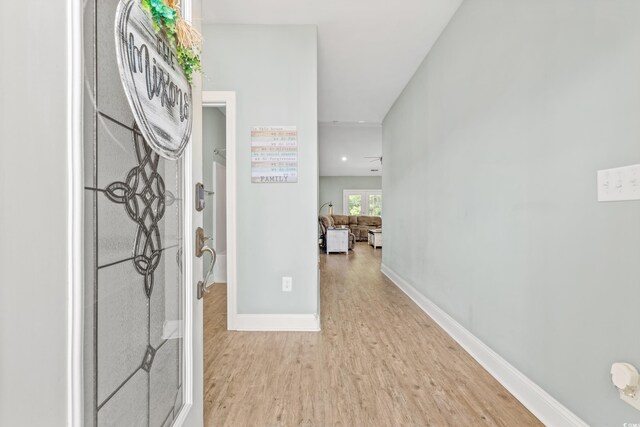 corridor featuring light wood-type flooring