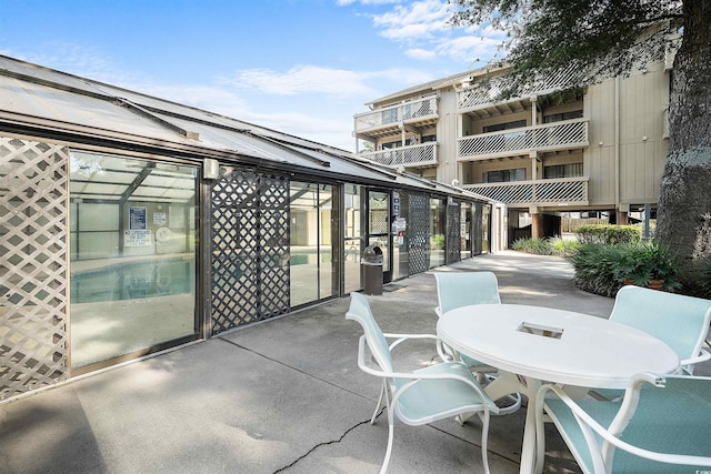 view of patio / terrace with a balcony