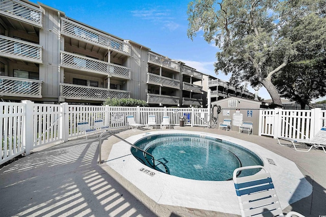 view of pool featuring a patio