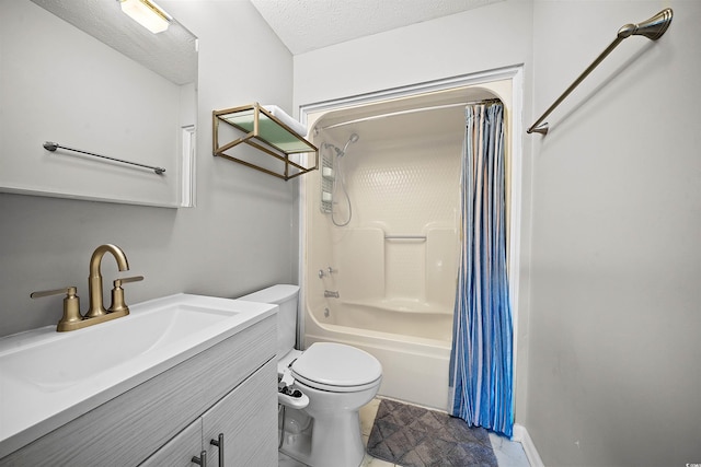 full bathroom with vanity, toilet, a textured ceiling, and shower / bath combo