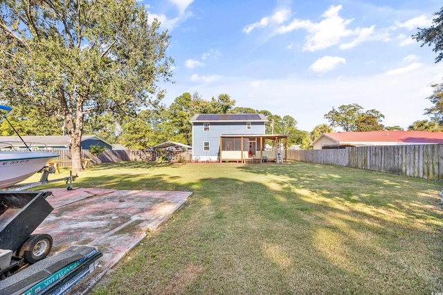 view of yard featuring an outbuilding and a patio