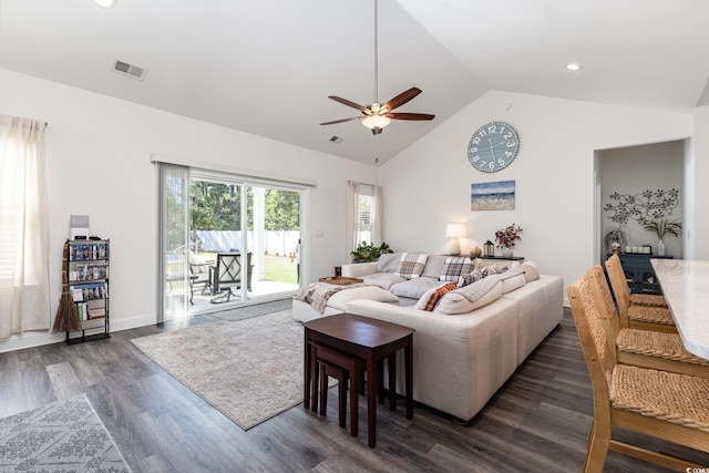 living room with ceiling fan, high vaulted ceiling, and dark hardwood / wood-style flooring