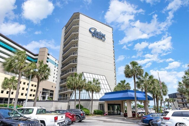 200 76th Ave N Unit 1106, Myrtle Beach, SC 29572 - view of property featuring uncovered parking