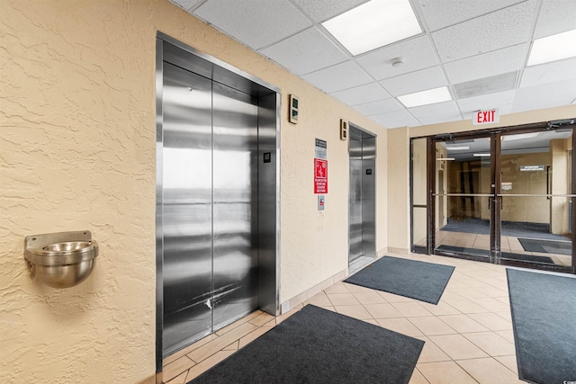 200 76th Ave N Unit 1106, Myrtle Beach, SC 29572 - building lobby featuring a textured wall and a paneled ceiling