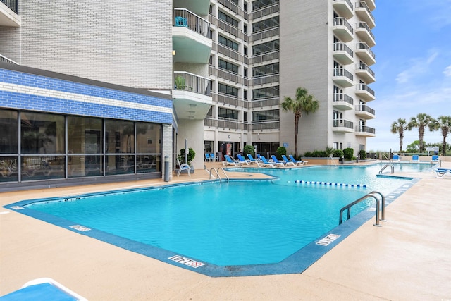 200 76th Ave N Unit 1106, Myrtle Beach, SC 29572 - community pool with a patio area