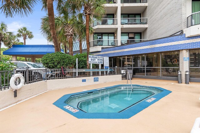 200 76th Ave N Unit 1106, Myrtle Beach, SC 29572 - view of pool with a hot tub