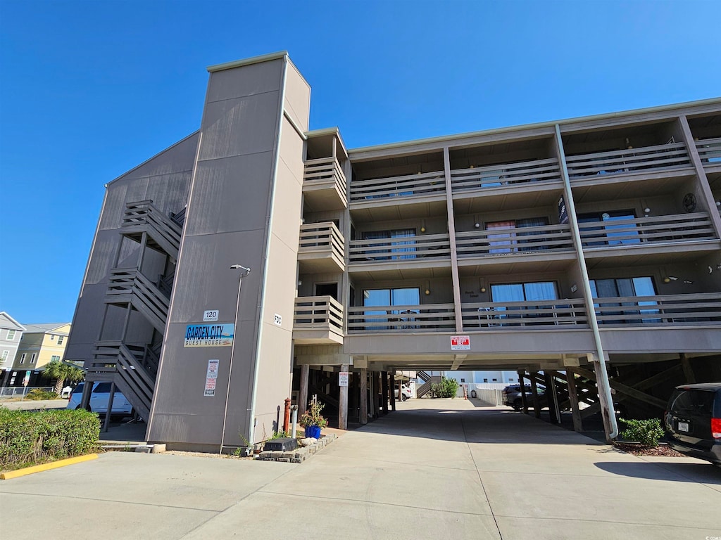 view of building exterior with a carport