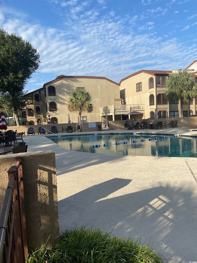 view of pool featuring a patio area