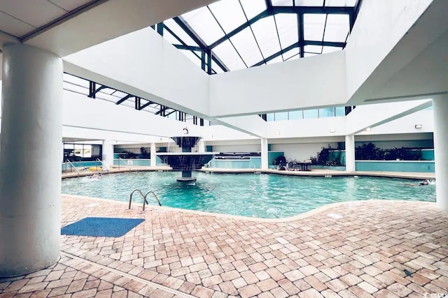 view of pool featuring a patio area