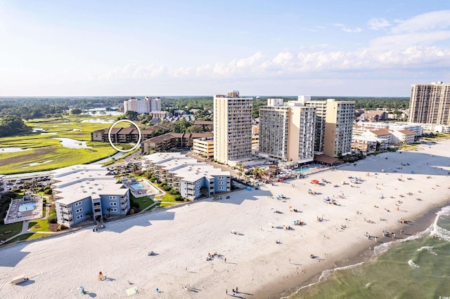 birds eye view of property with a view of the beach