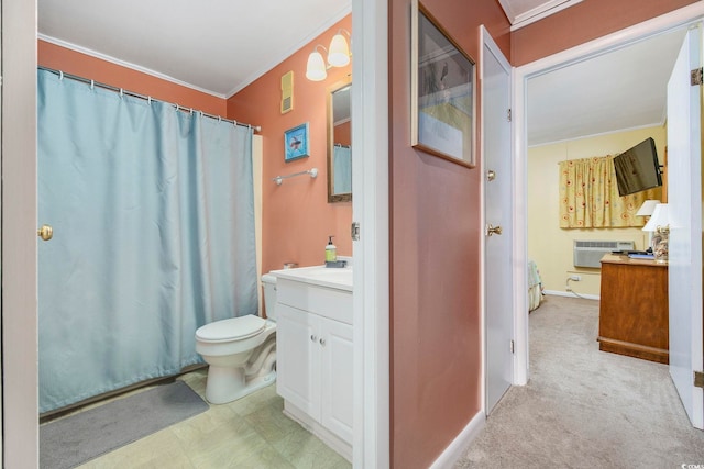 bathroom with ornamental molding, a wall unit AC, toilet, and vanity