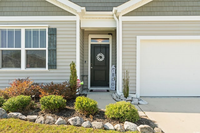 entrance to property featuring a garage