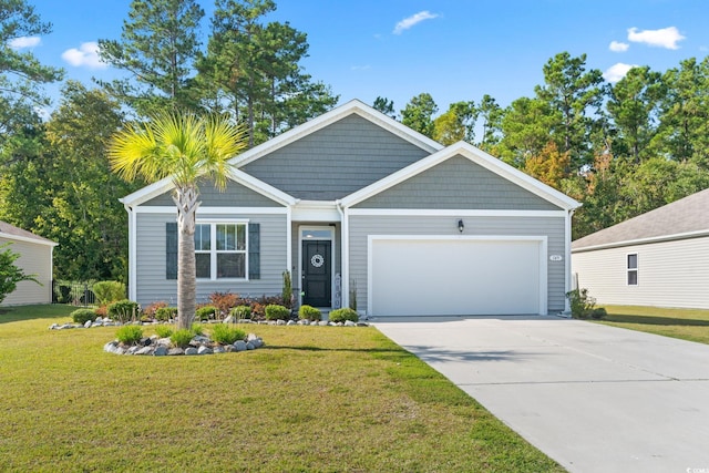 craftsman-style house with a front yard and a garage