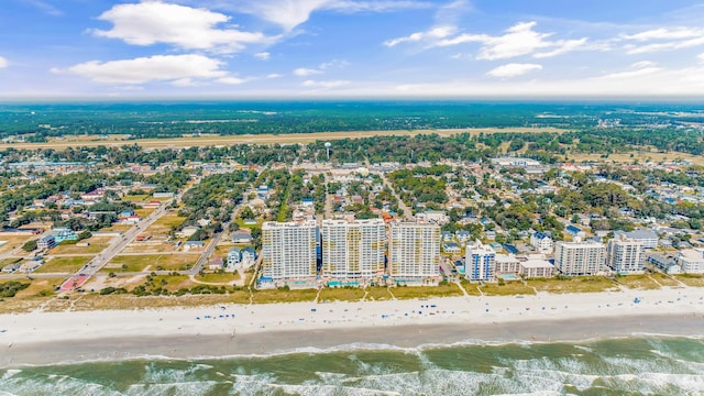 aerial view featuring a water view and a view of the beach