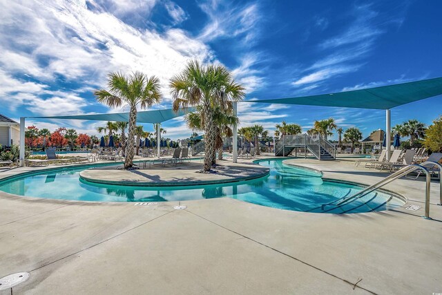 view of pool with a patio area