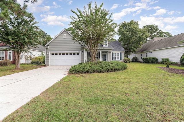 view of front of house featuring a garage and a front yard