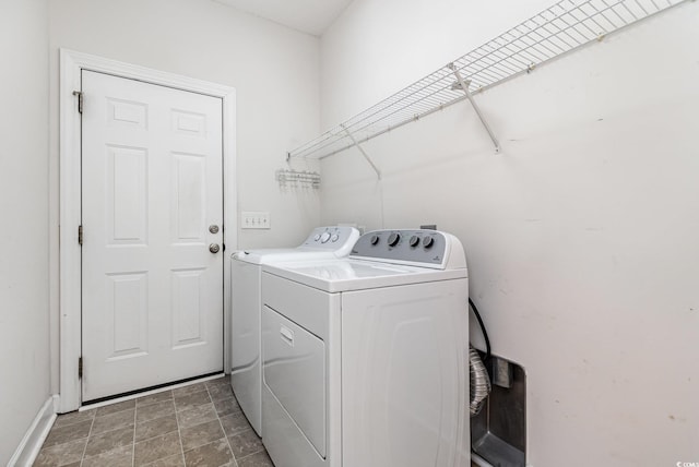 laundry area with separate washer and dryer