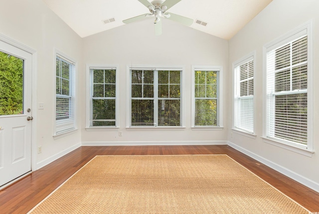 unfurnished sunroom with vaulted ceiling and ceiling fan