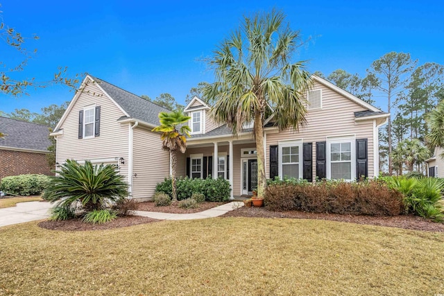 view of front of home featuring a front lawn