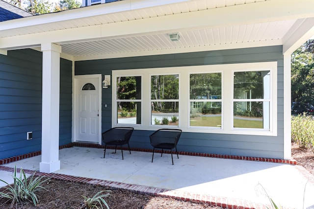 doorway to property with covered porch