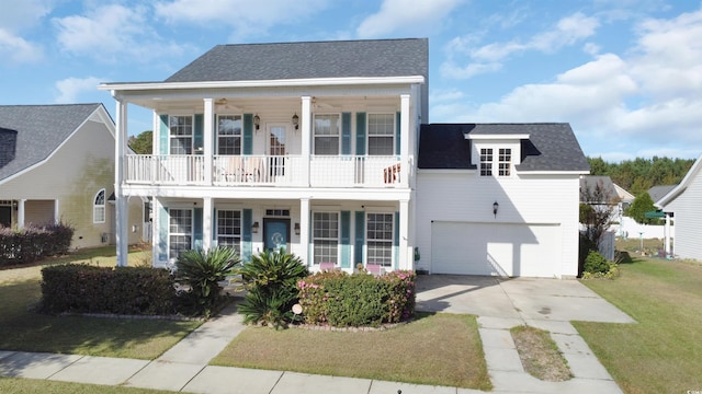 view of front facade featuring a front lawn, a garage, covered porch, and a balcony