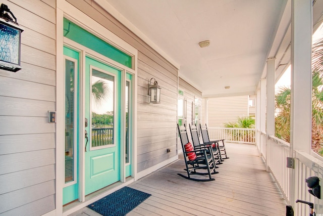 wooden deck with a porch