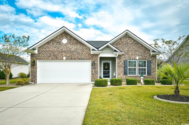 view of front facade with a front lawn and a garage