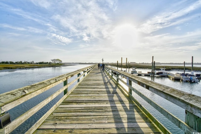 dock area featuring a water view