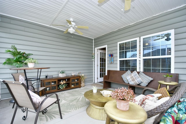 exterior space featuring ceiling fan