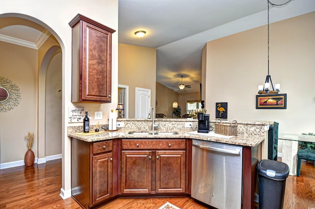 kitchen with ceiling fan, wood-type flooring, crown molding, sink, and dishwasher