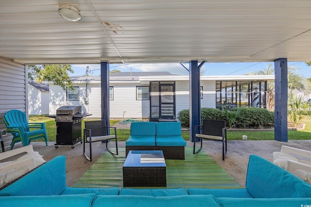 view of patio / terrace featuring outdoor lounge area and a grill