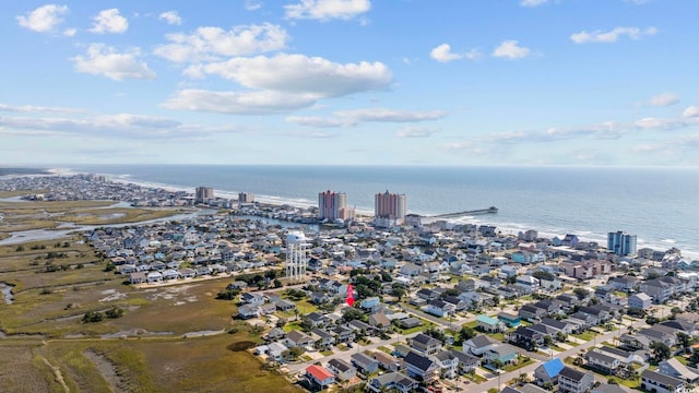 bird's eye view featuring a water view and a residential view