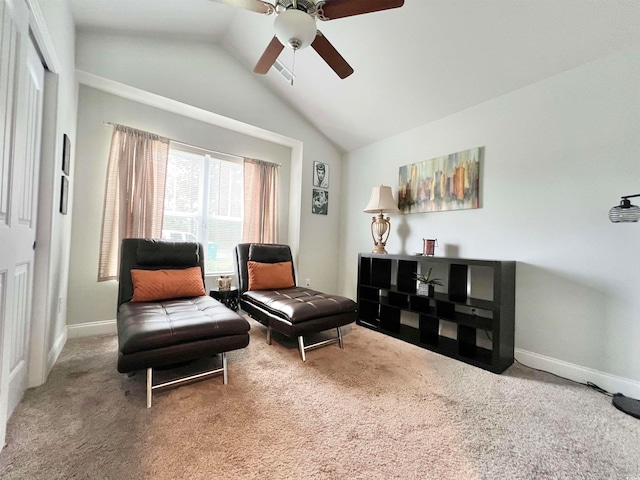 sitting room featuring ceiling fan, carpet, and vaulted ceiling