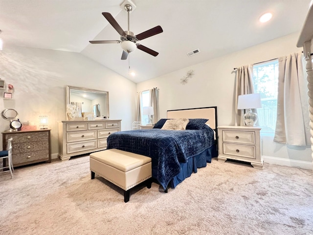 bedroom with lofted ceiling, light carpet, and ceiling fan