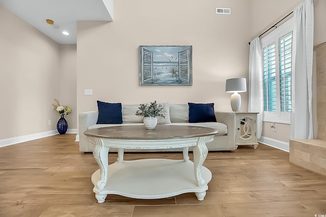 1002 Summers Pl, North Myrtle Beach, SC 29582 - living area with visible vents, baseboards, recessed lighting, and light wood-style floors