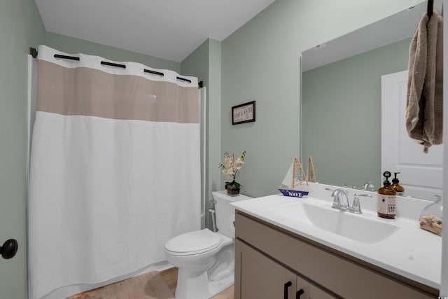 full bathroom with toilet, vanity, and shower / tub combo with curtain