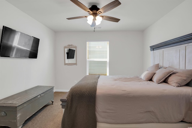 bedroom with light carpet and ceiling fan